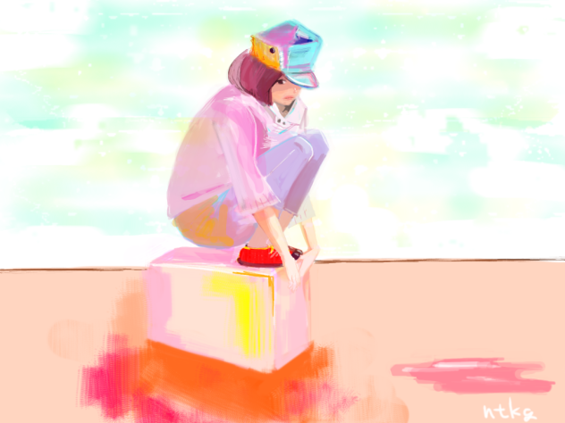箱の上の少女