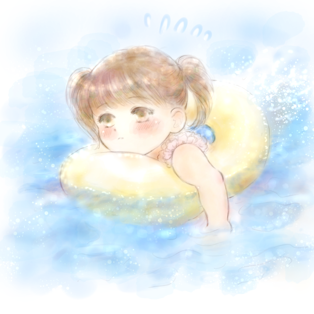 浮き輪で泳ぐ女の子。
