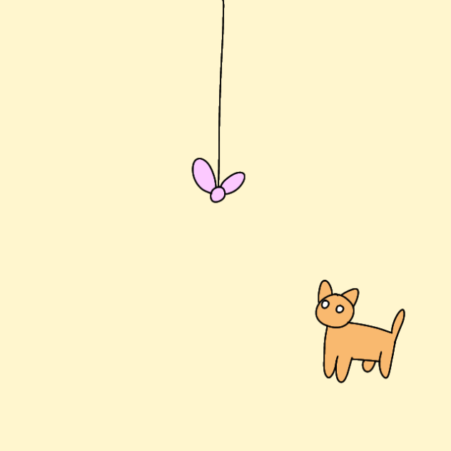 Котёнок играет с ленточкой