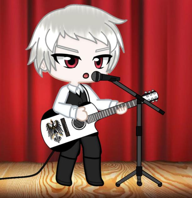 Prussia plays electric acoustic guitar