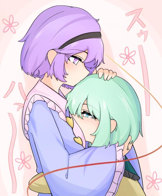 嗅ぎ合う2人