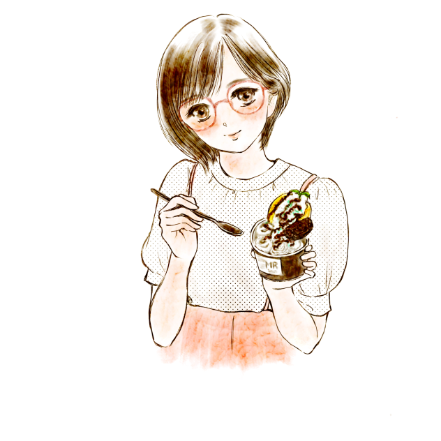 チョコミントアイスを食べる女の子。
