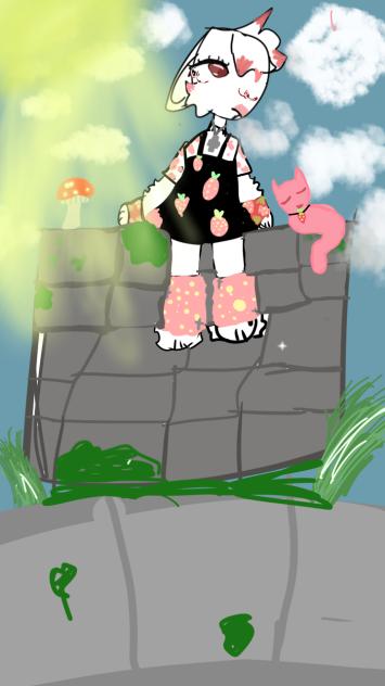 straw bunny sitting on a stone wall