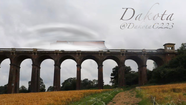 Dakota zooming over a bridge
