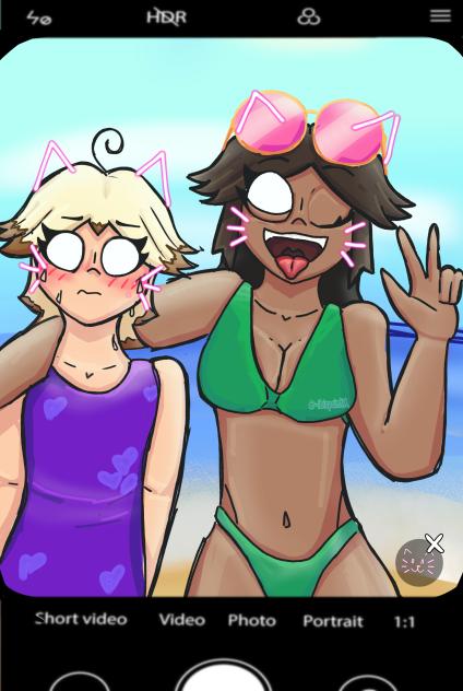 Nova and Axelle at the beach 😺