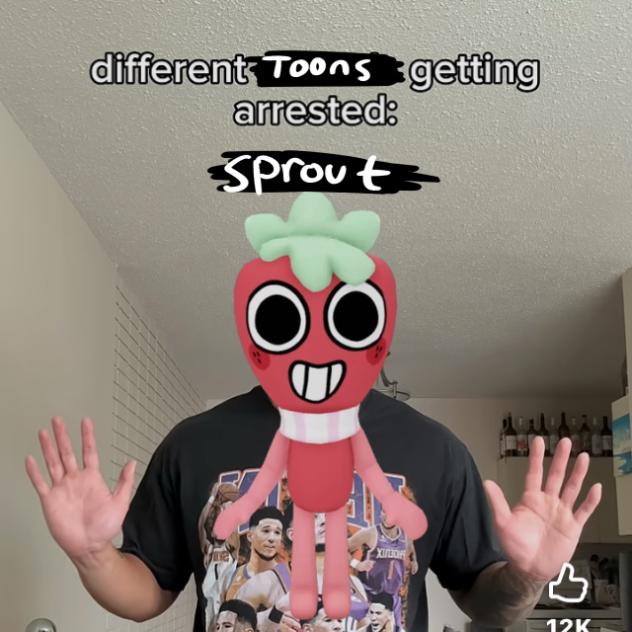 strawberry and a cookie fend a cakeroll