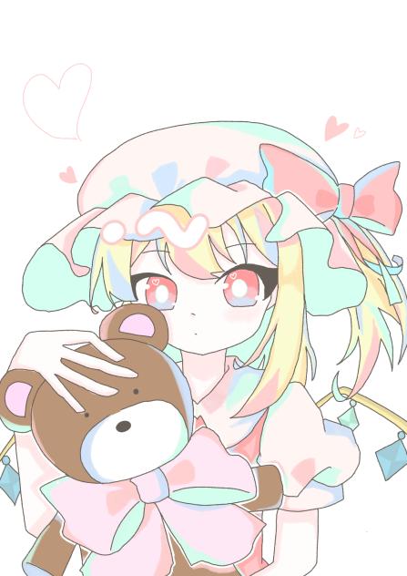 何？