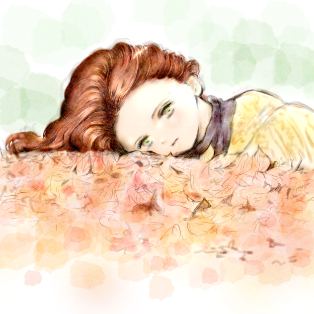 落ち葉の中横たわる女性