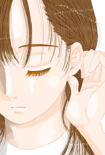 髪を耳にかける女性