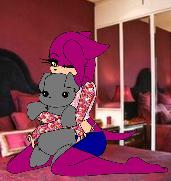 Olivia The HedgeHog Holding A Plushie