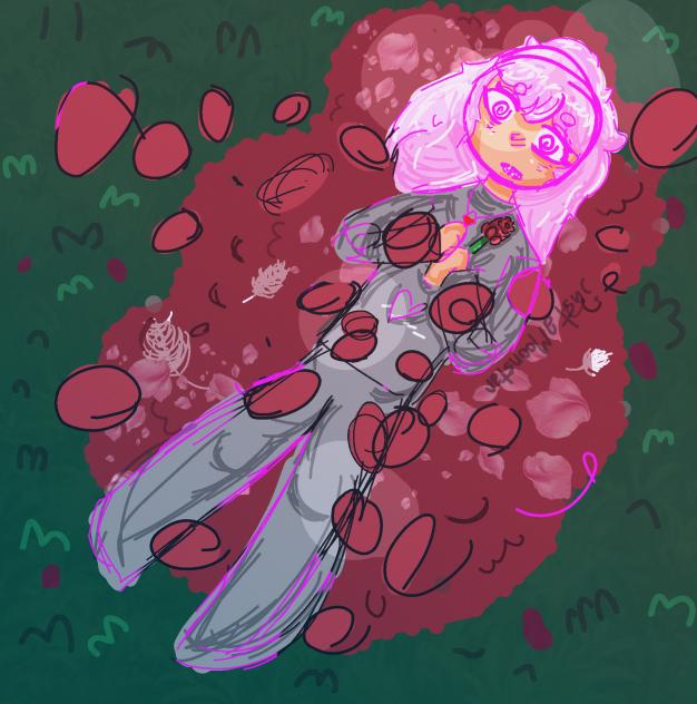 As she lays in a pile of roses