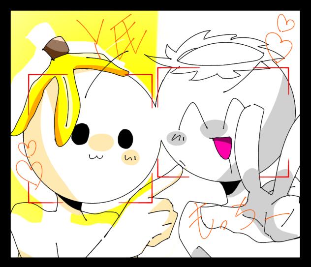 写真を撮る2人