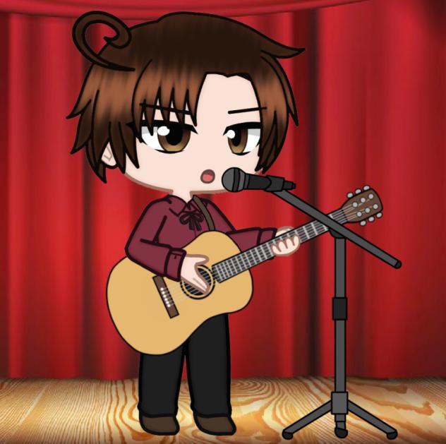 Romano playing acoustic guitar