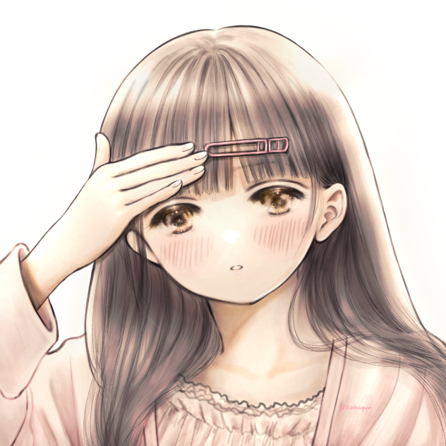 朝寝癖を直してる女の子。