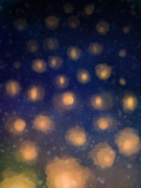 背景 天に舞う光