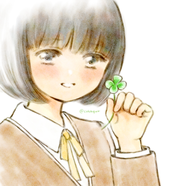 四つ葉のクローバー見つけた女の子。